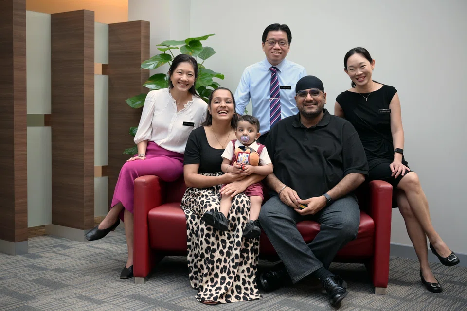 Mannat Singh and parents Harminder Kaur and Harminder Singh, with KKH doctors (back row, from left) Michaela Seng, Ting Teck Wah and Bianca Chan.