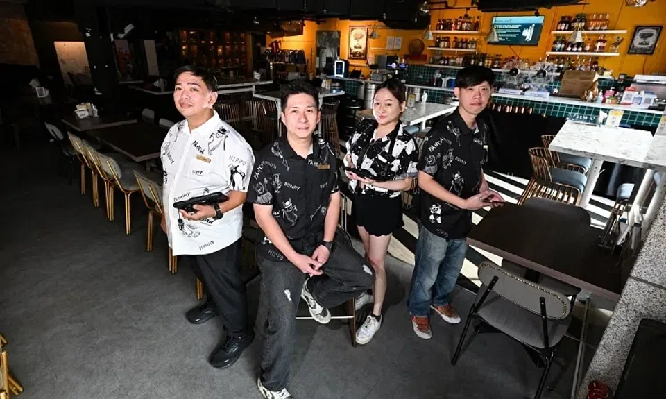 (From left) Tipsy Collective staff - supervisor Imran Bin Mohamed Jais​, assistant man​ager​ ​Jason ​Lim​, events ​manager Kelwen Liew​ and supervisor ​Derrick ​Leong ​- pictured at the Tipsy Penguin gastropub at NTUC Income@Tampines Junction on Jan 2.