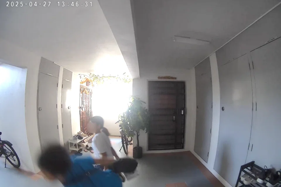 The video showed the boy jumping to kick the girl and losing his balance before a thud was heard. 