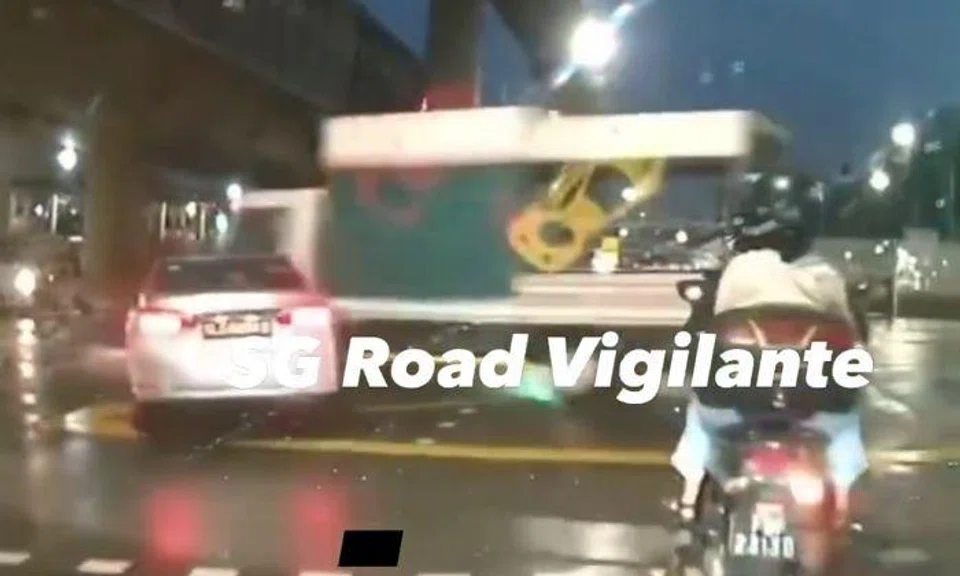 Truck driver assisting with investigations after running red light and hitting 2 cars