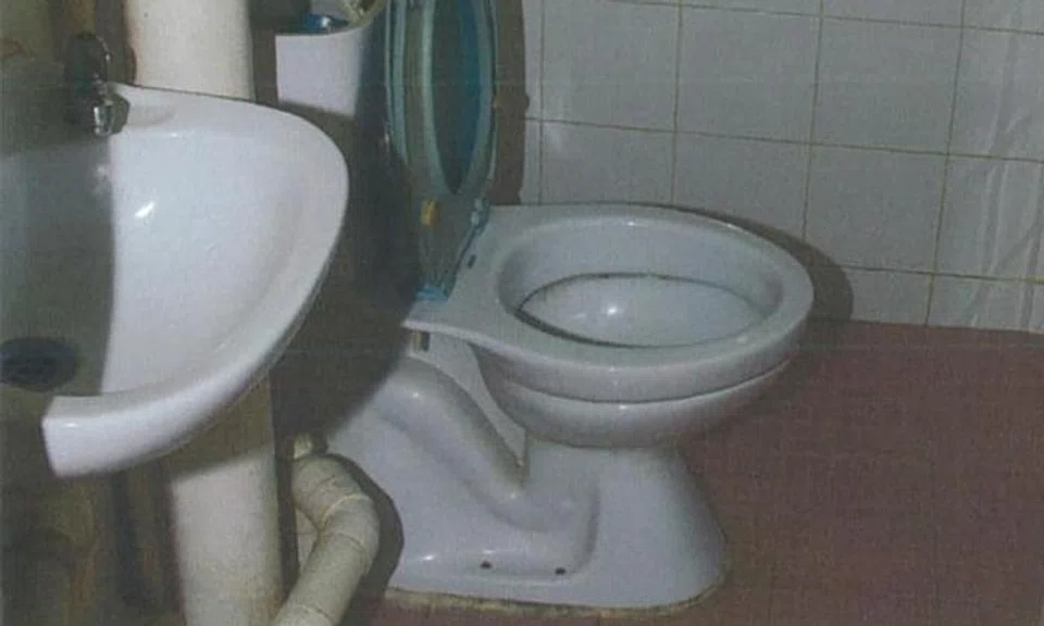 The children were confined naked in the toilet for nearly 10 months.