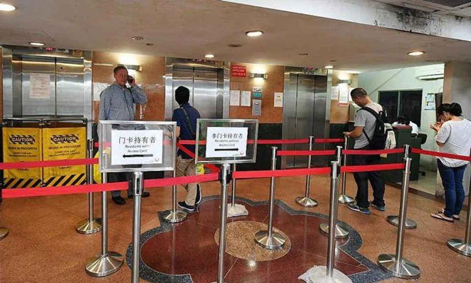 Above: Of the three residential lifts, one has been out of operation since December. PHOTOS: LIM YAOHUI, RAZOR TV