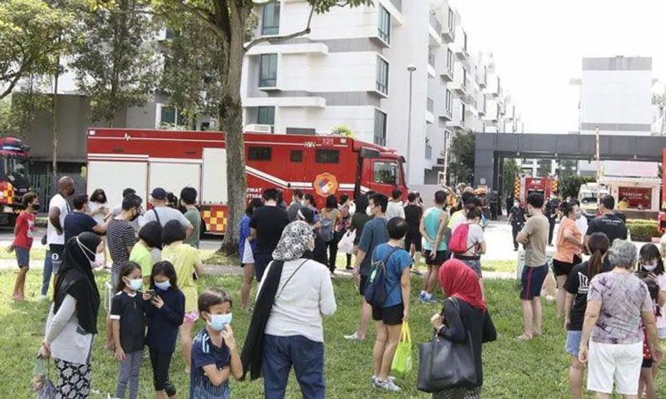 One resident said the evacuation site was a little chaotic and that the elderly may have found it tough to stand under the sun for a long time. PHOTO: LIANHE ZAOBAO