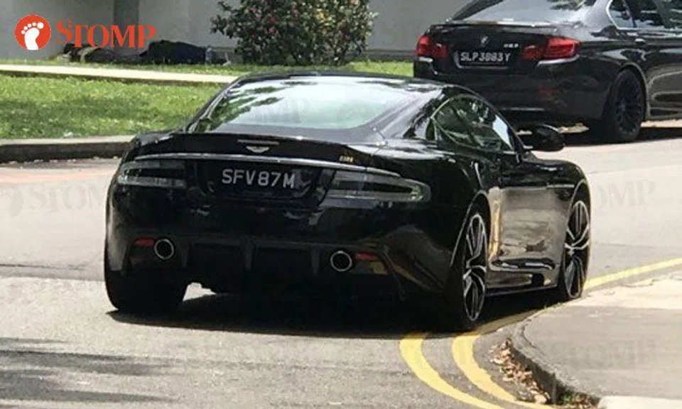 Nice Aston Martin -- but too bad its driver does not have the parking skills to match