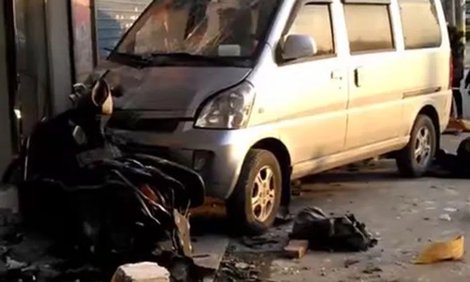 Chinese man rams dog hunter through wall with van after beloved pet was killed by poison dart