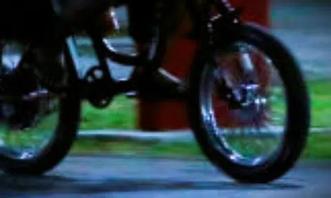 Teen PAB rider evading roadblock knocks down police barrier, falls off bike and flees on foot