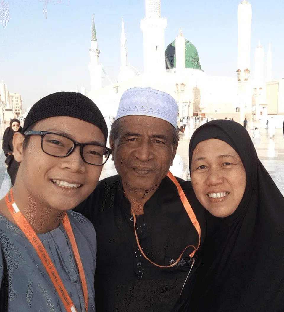 Ahmad Ashrafiqri Kahar Muzakar and his foster parents