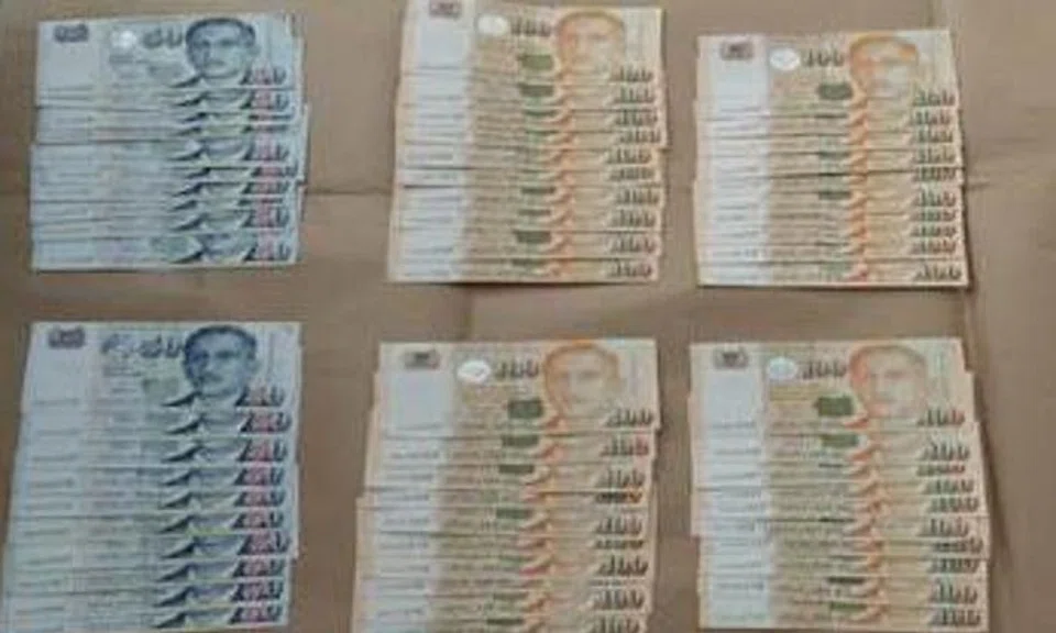 A woman was allegedly deceived into handing over $90,000 in cash to unknown people. 