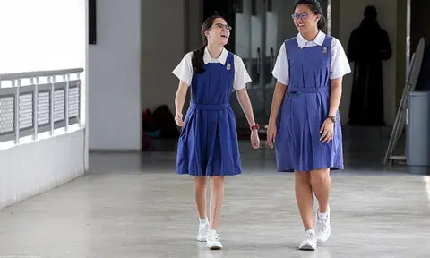 These two CHIJ Sec alumni act as each other's eyes and ears