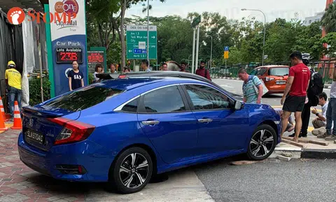 Driver loses control and crashes car onto kerb outside Lot One shopping mall