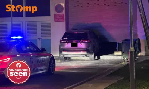 Car crashes into Hougang rubbish collection point, driver taken to hospital