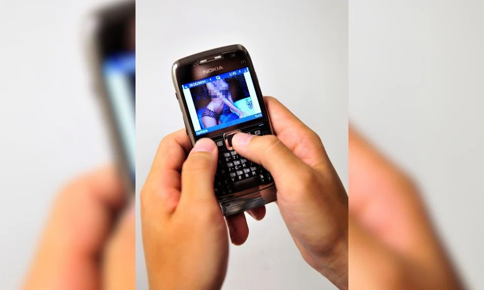 voyeurism charges, secret recordings, Singapore court