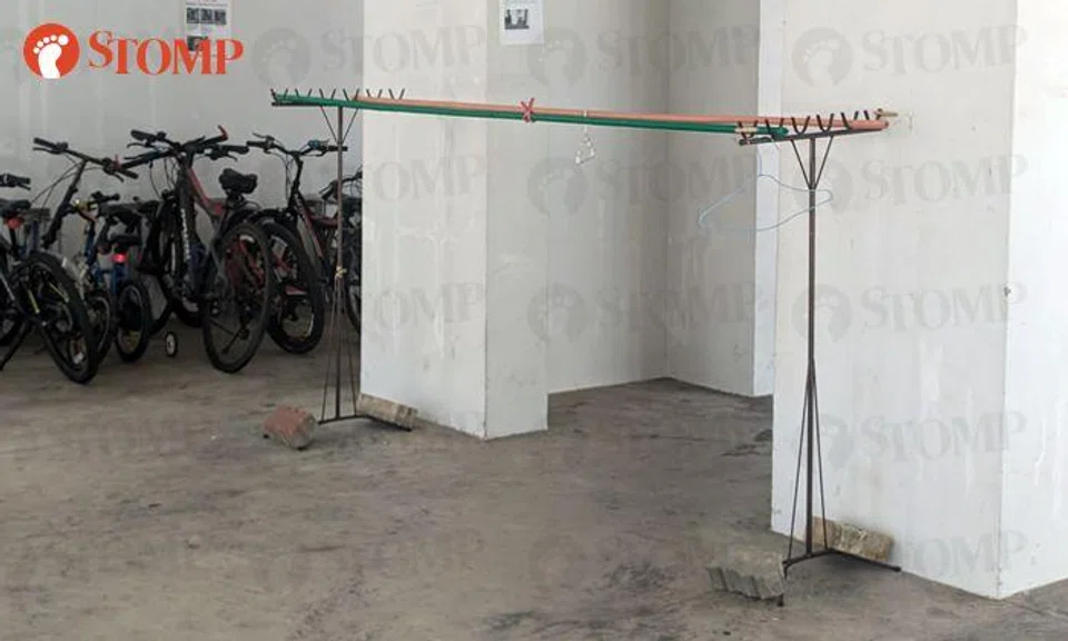 Town council removes bamboo rack causing danger and obstruction at Segar Road void deck