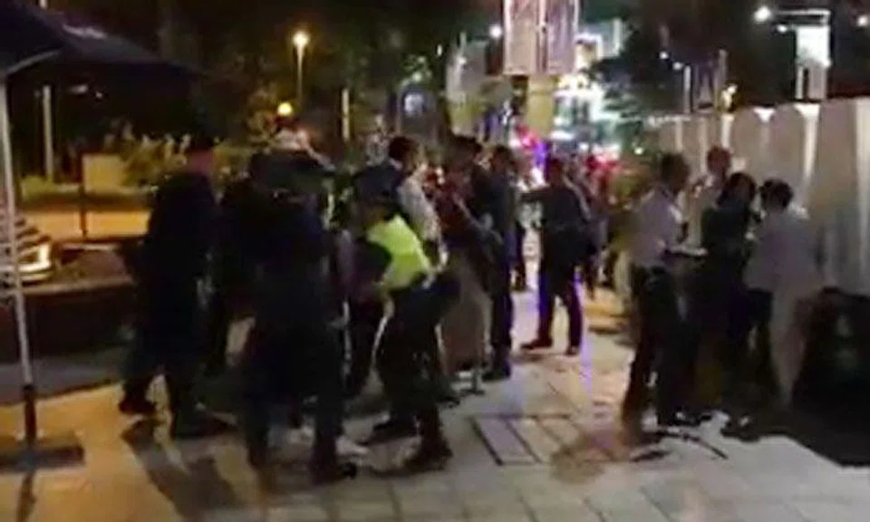 5 South Korean women put up struggle while getting arrested for causing trouble near St Regis hotel