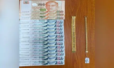 Cash amounting to $900 were recovered from the man as well as the bracelets. Photo: Singapore Police Force