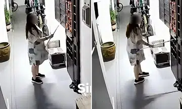 woman hits noisy neighbour’s unit with clothes fork