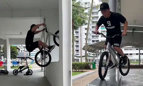 Netizens criticise youth for 'spoiling' public seating after performing bike stunts at HDB void deck