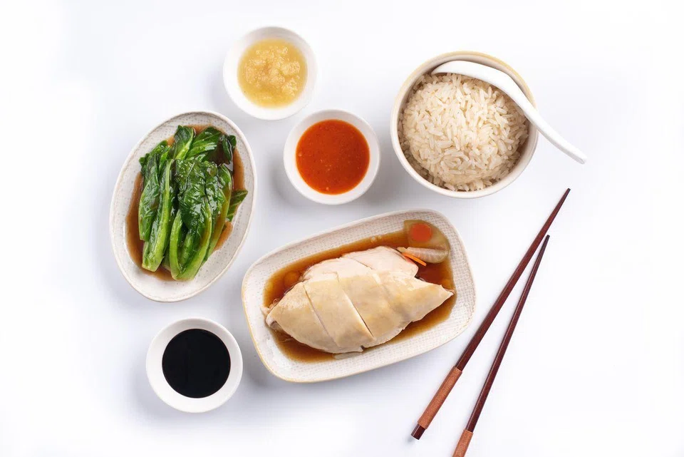 While chicken rice originated in Hainan, China, the version served in Singapore hawker centres today is a hybrid. 