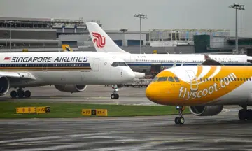 flight cancellations to and from singapore due to typhoon bavi