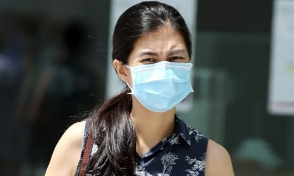 Felicia Lee Ziying, 31, who was intoxicated at the time, hurled vulgarities at police officers and also hit one of them in the arm at a petrol station in Holland Road in the early hours of Aug 7, 2018. Photo: The Straits Times