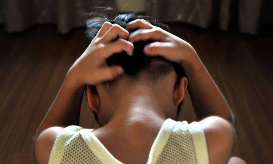 Ex-teacher admits to punching, slapping and calling stepson 'prostitute's child'