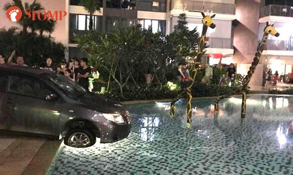  Car in Sembawang condo pool: Driver still missing, had taken wrong turn after asking for directions