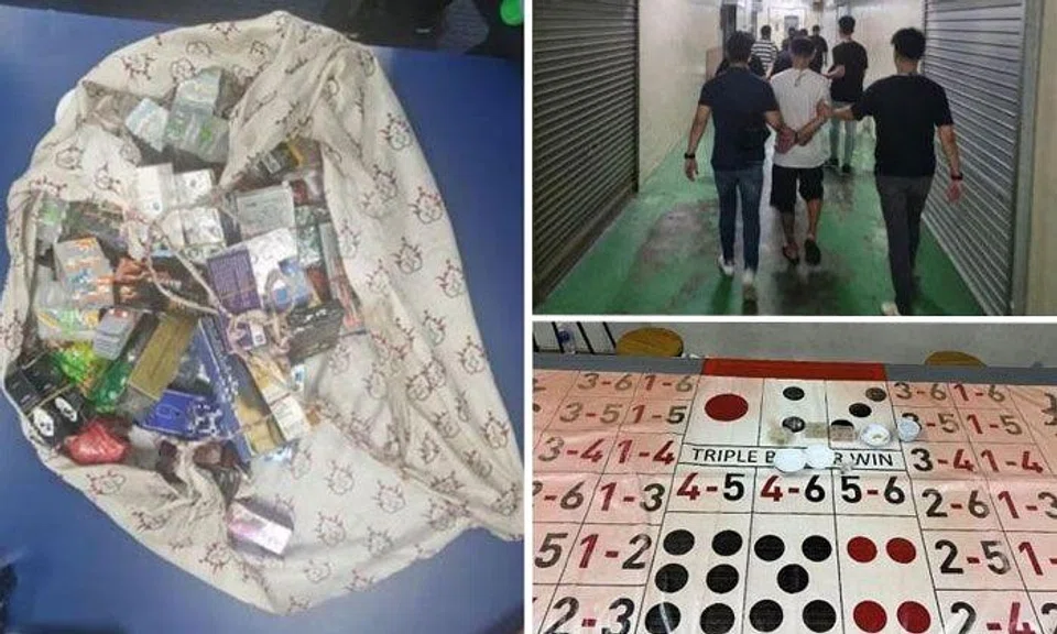 Gambling-related paraphernalia (bottom left) and sexual enhancement products (right) were among items seized in the operation. PHOTOS: SINGAPORE POLICE FORCE