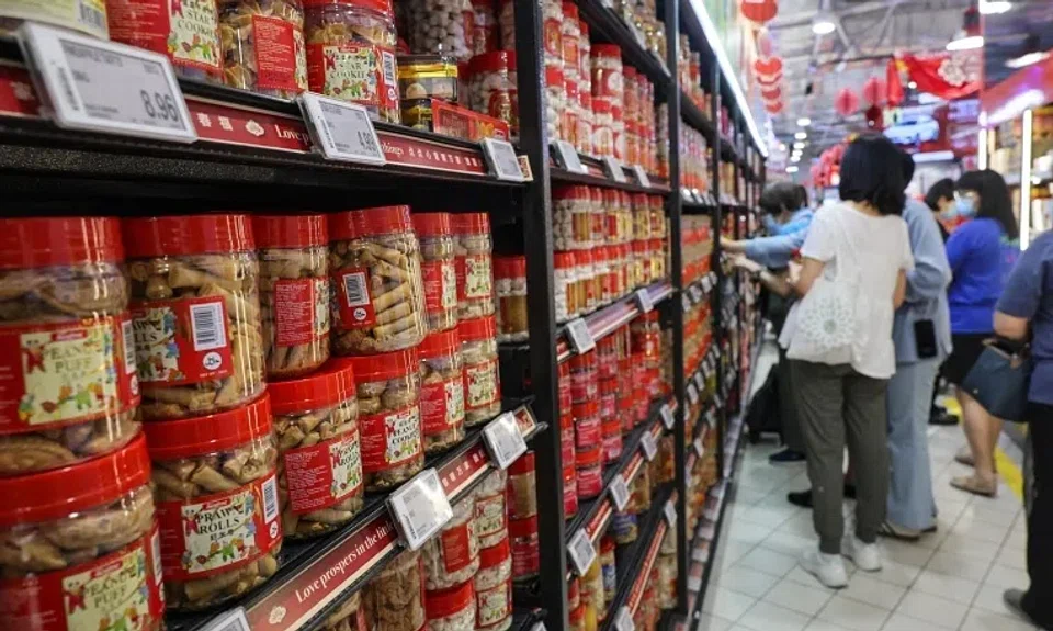 The vouchers are part of efforts to help customers stretch their dollar in the Chinese New Year season. 