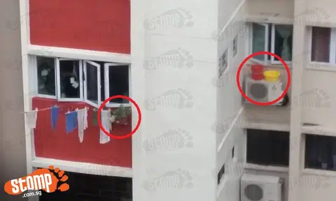 Residents leave flower pot and buckets on window ledge of Blk 111 Serangoon North Ave 1