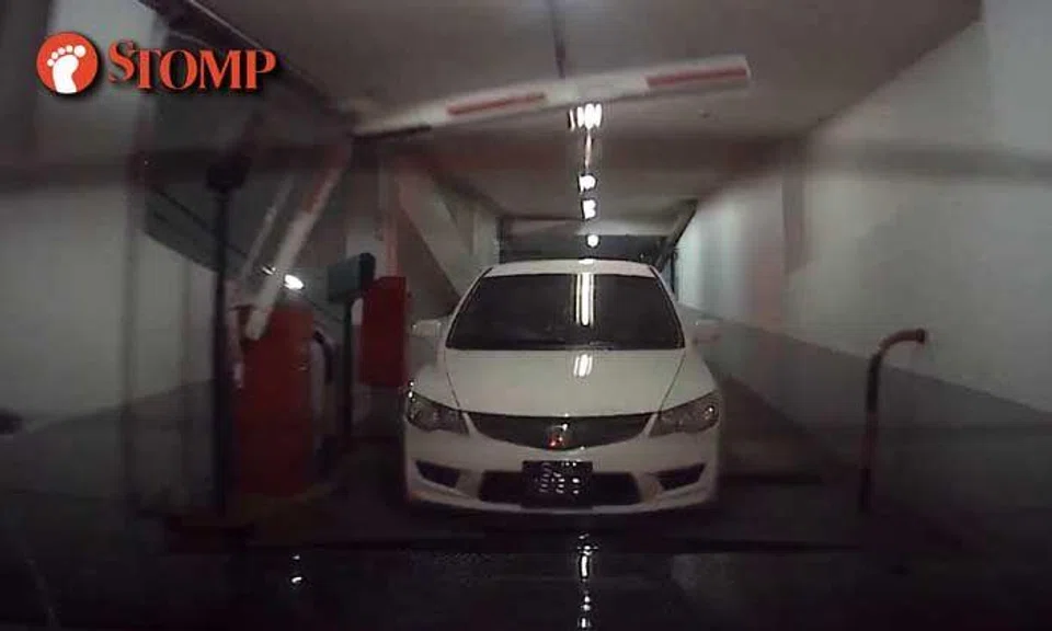 Driver tailgates car past Mandarin Orchard carpark gantry, turns off headlights to be tactical