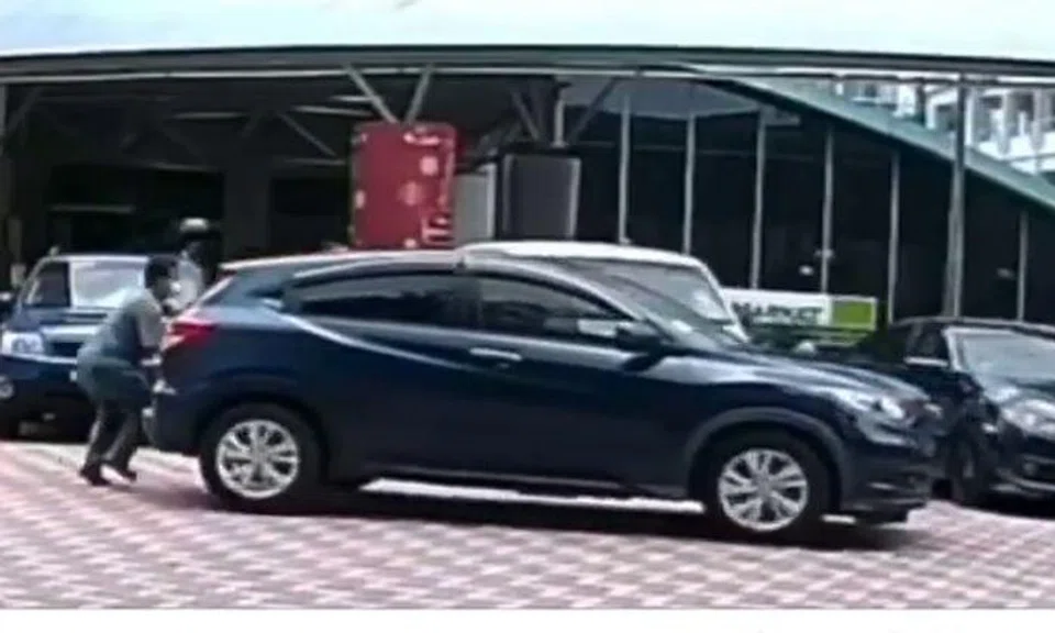 Whose fault? Driver reverses into pedestrian outside Elias Mall