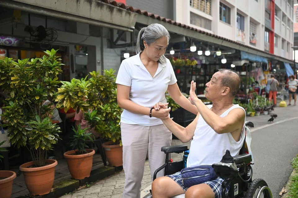 Nee Soon GRC MP Carrie Tan mingling with a resident near Yishun Ring Road on April 22.