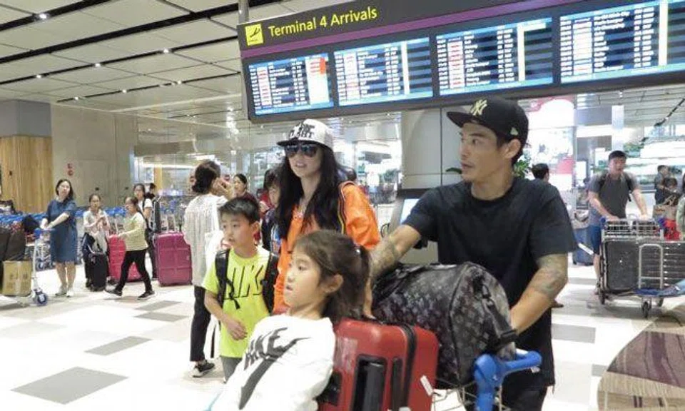 Cheung and her family were spotted at Changi Airport on Wednesday afternoon. Photo: Lianhe Zaobao