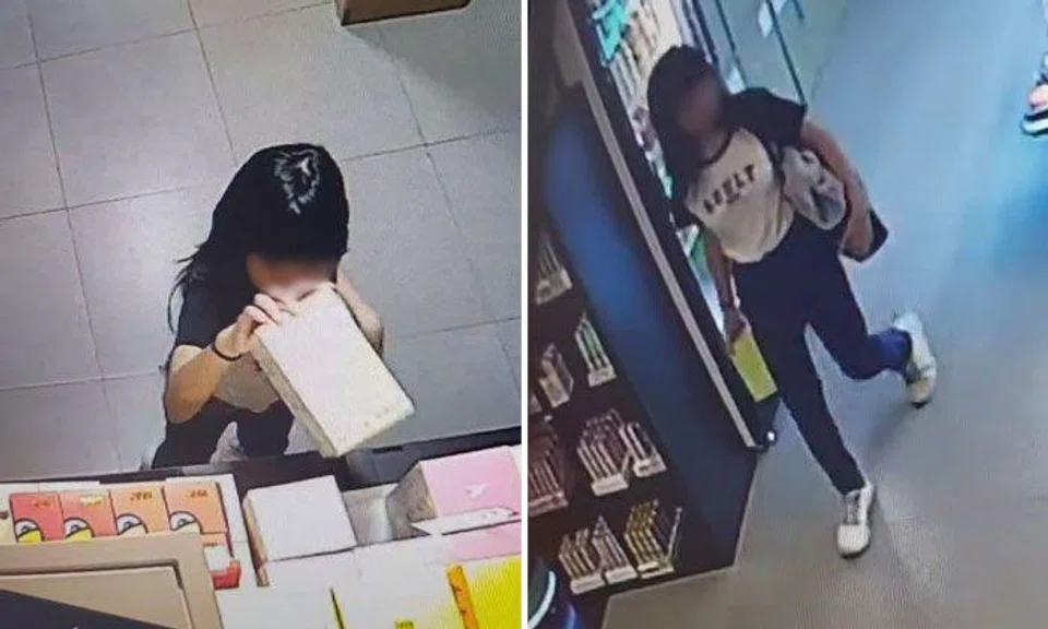 According to the video footage, the young woman, wearing a black and white top and jeans, went straight to the shelf where the Labubu figurines were displayed and quickly grabbed an item from the top shelf. PHOTOS: LIANHE ZAOBAO
