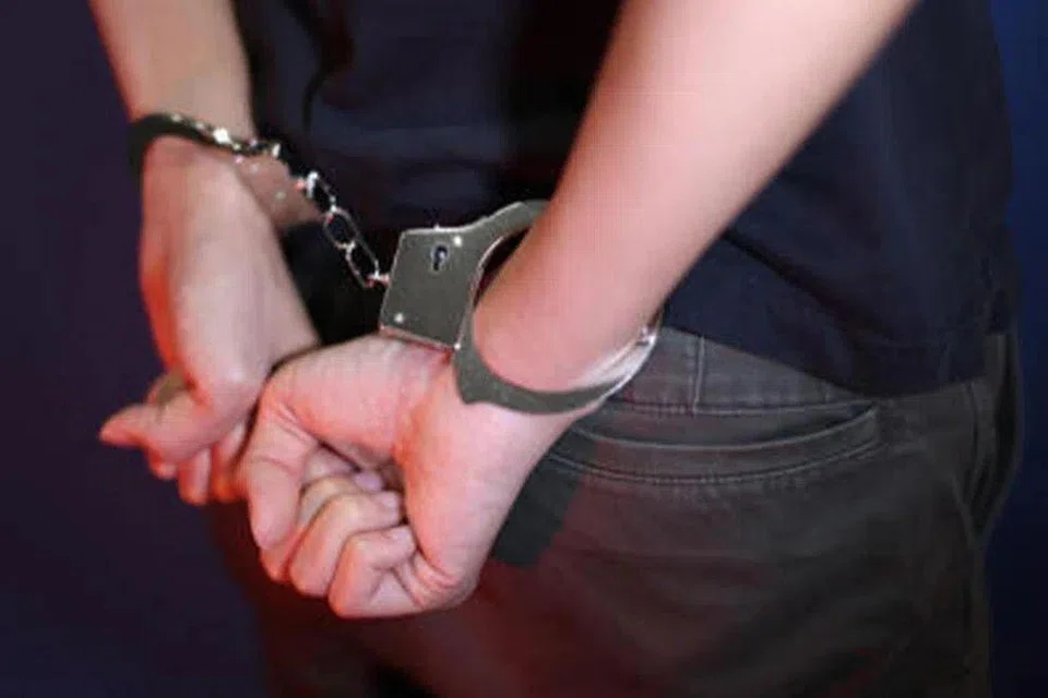 When officers from Woodlands Police Division were attending to the incident, a man charged towards an officer and was arrested. 