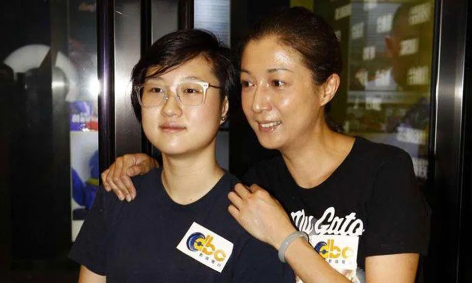 Former beauty queen Elaine Ng with daughter Etta.PHOTO: APPLE DAILY