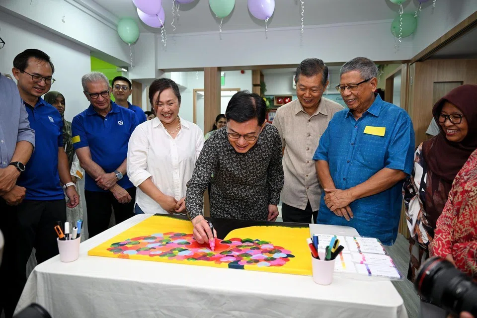 Deputy Prime Minister Heng Swee Keat taking part in an art activity at the official opening of Casa Raudha headquarters in Bedok on Feb 22.
