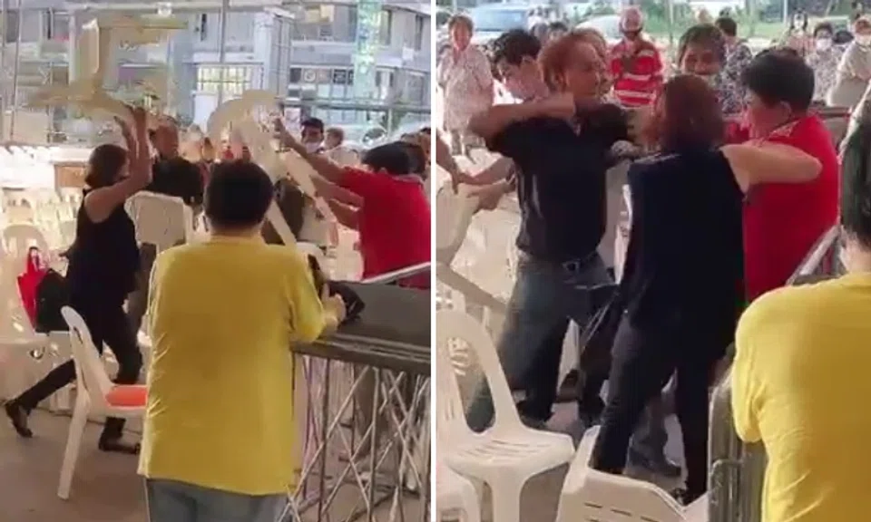 A man punched a woman repeatedly until her face was bloody after she threw a chair at another woman in Ubi on Wednesday (Aug 10).