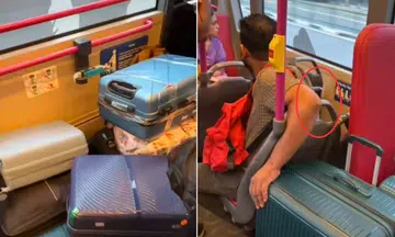 Pieces of luggage were seen occupying the designated wheelchair and stroller area on a Service 36 bus. 