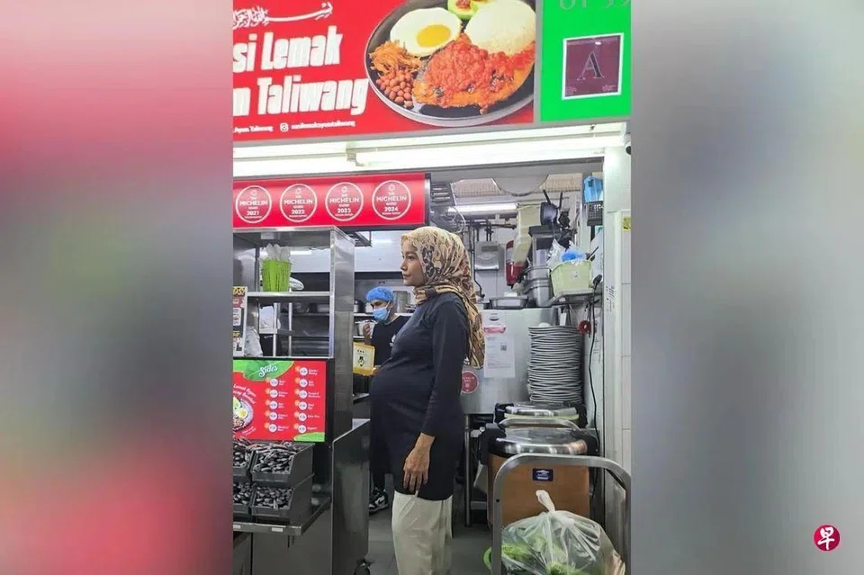 Mr Noorman Mubarak shared this photo of his wife Puti Andam Dewi Henry standing at the stall in Yishun.