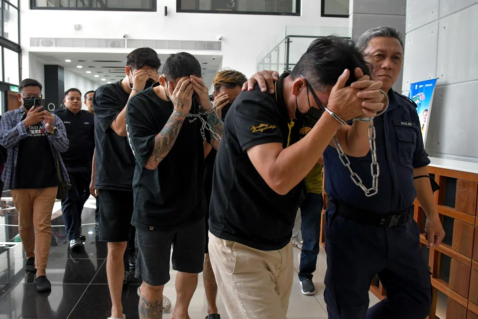 The three Singaporeans, aged 25 to 45, were charged alongside a 57-year-old Malaysian.