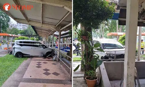 Car crashes into sheltered walkway after accident with taxi in Woodlands