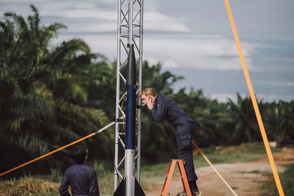 A 2020 photo of Mr Simon Gwozdz inspecting a prototype rocket in Malaysia. He is the founder and chief executive of Equatorial Space, a Singapore-based start-up developing rockets and space launch services.