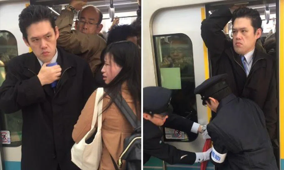Man keeps impressive stone face as he and other commuters are shoved into packed train during rush hour in Tokyo 