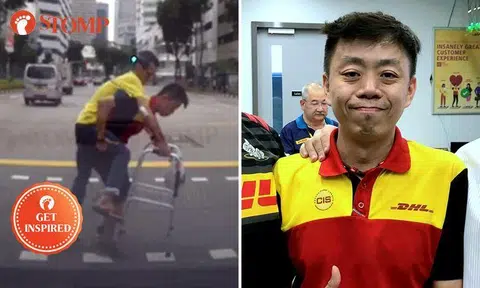 Anson Chung, 40, was caught on camera piggybacking an elderly man across the road on May 17.