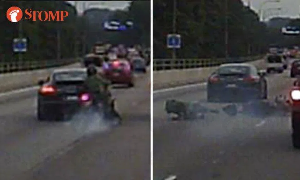 Tailgating Porsche abruptly changes lanes without signalling, causes NSman biker to crash -- then flees