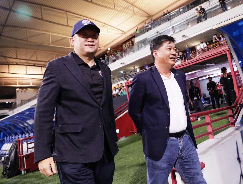 Sea Limited founder Forrest Li (left) is seen with current president of the Football Association of Singapore Bernard Tan at Jalan Besar Stadium on Dec 9, 2023.