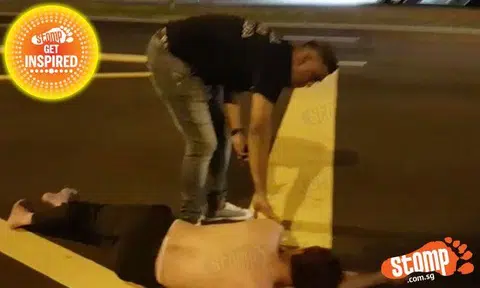 Man asleep in middle of road saved from oncoming vehicles thanks to kind passers-by