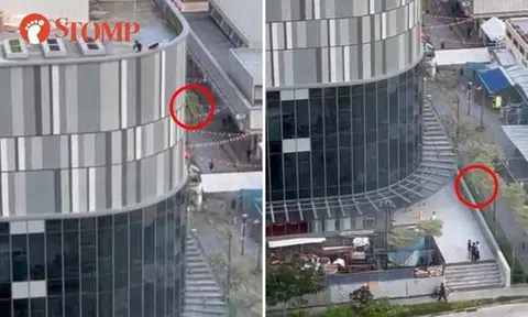 Boys throw water balloons at people below from rooftop of new mall in Marine Parade