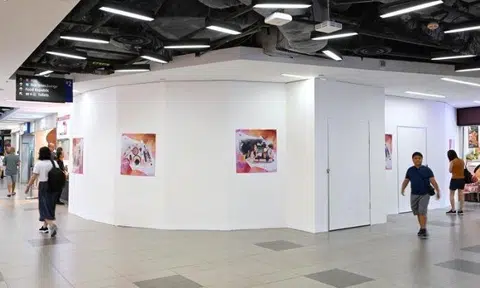 The shop space previously occupied by Emart24 at Nex was boarded up. Photo: The Straits Times